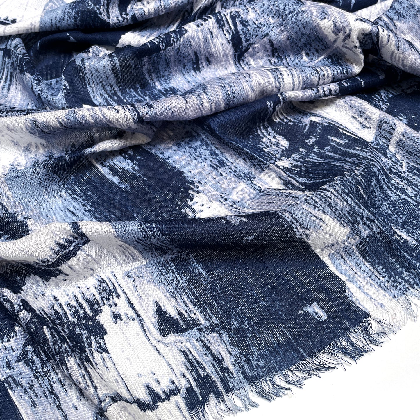 Cotton Rayon scarf texture close-up showing abstract blue design