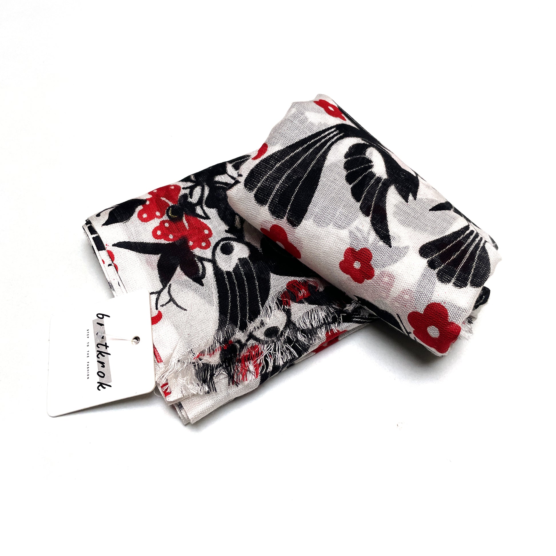 Cotton Rayon scarf flat lay showing black animal prints