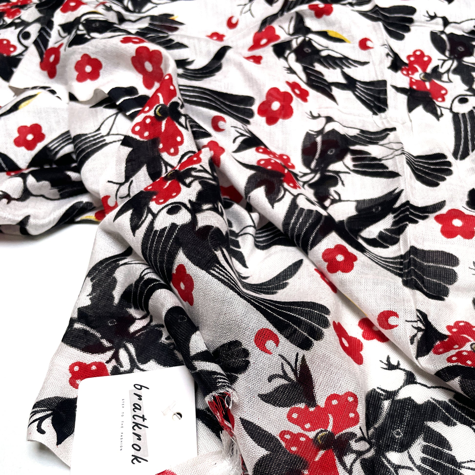 Cotton Rayon scarf texture close-up showing black birds print