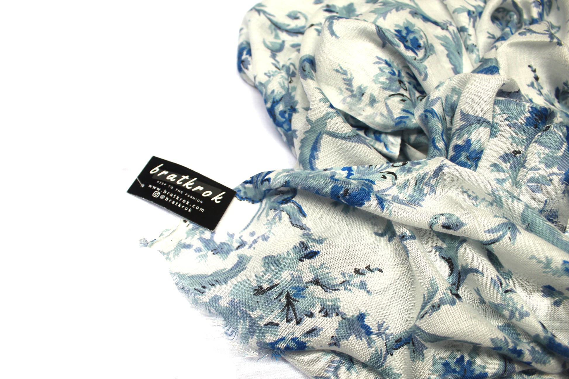 Cotton Rayon scarf texture close-up showing floral prints
