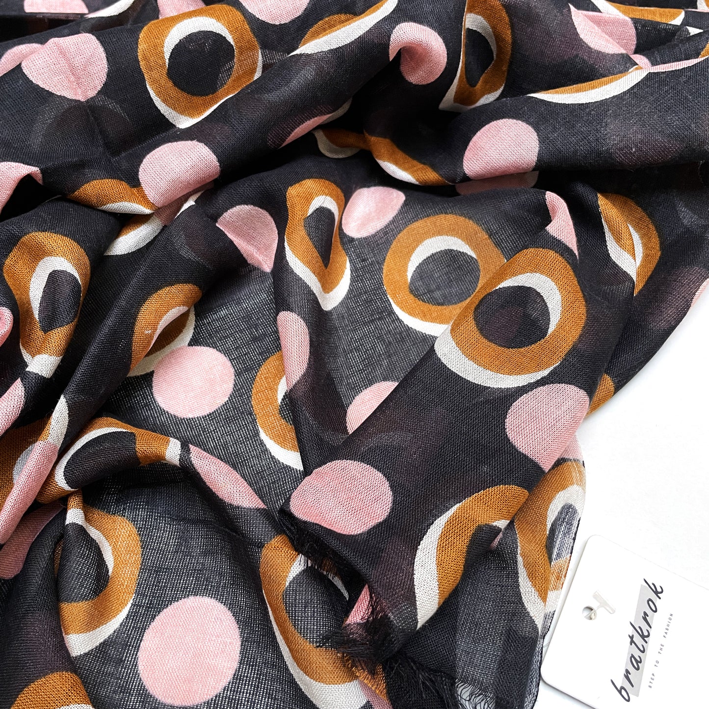 bratkrok Cotton Rayon scarf texture close-up showing black stole with pink and brown rings design over it