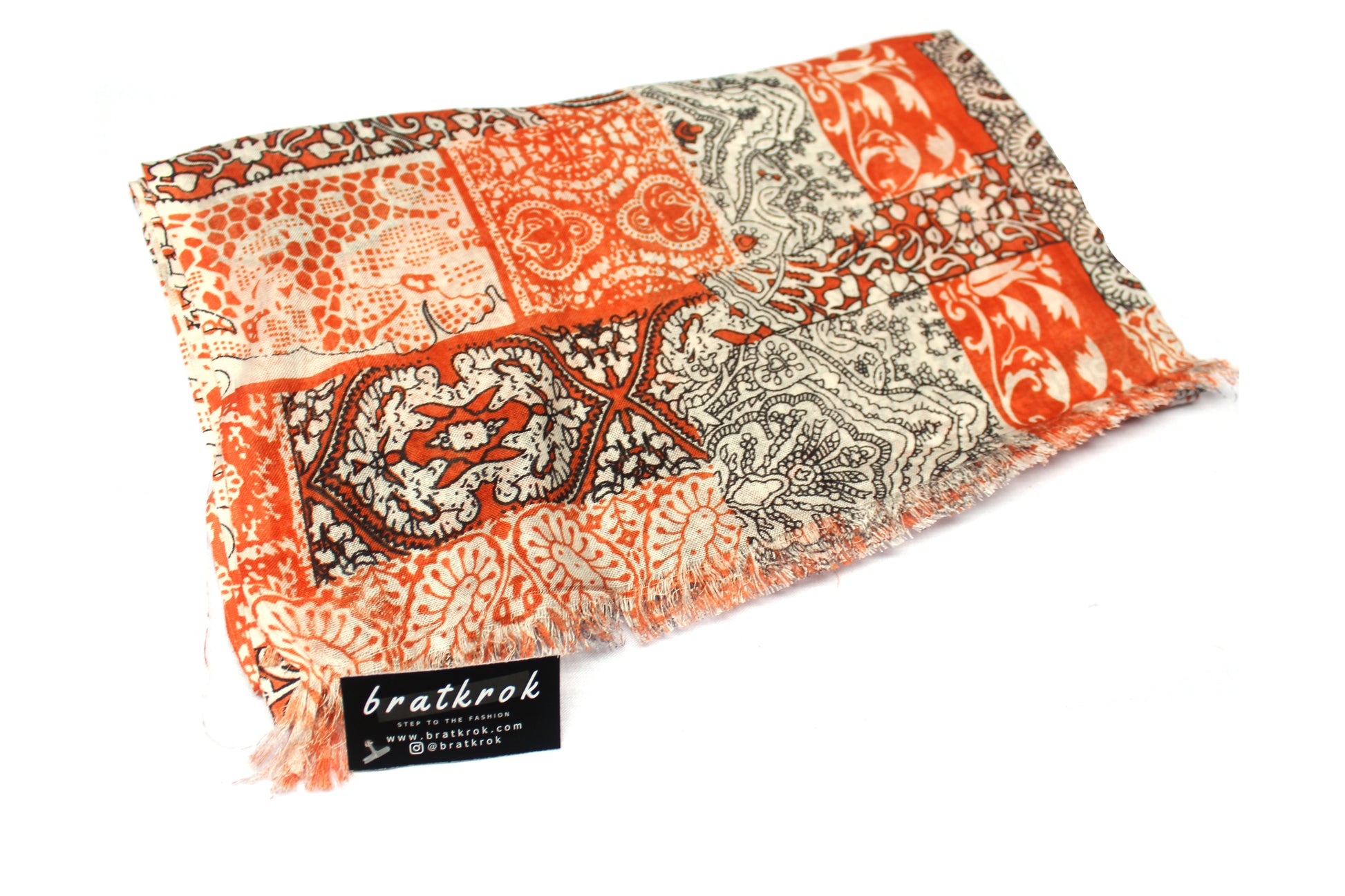 Cotton Rayon scarf flat lay showing orange design
