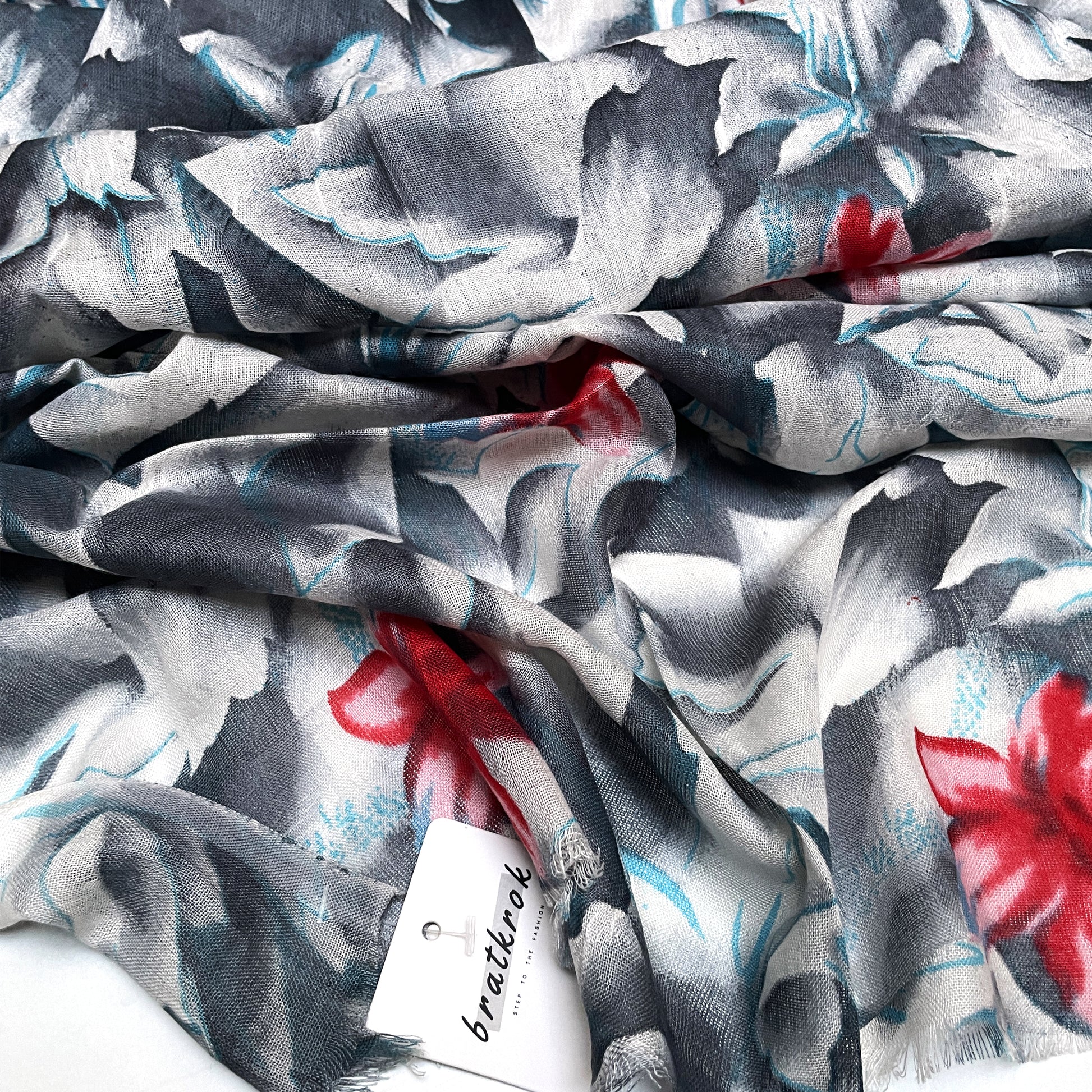 
Cotton Rayon scarf texture close-up showing grey floral design stole