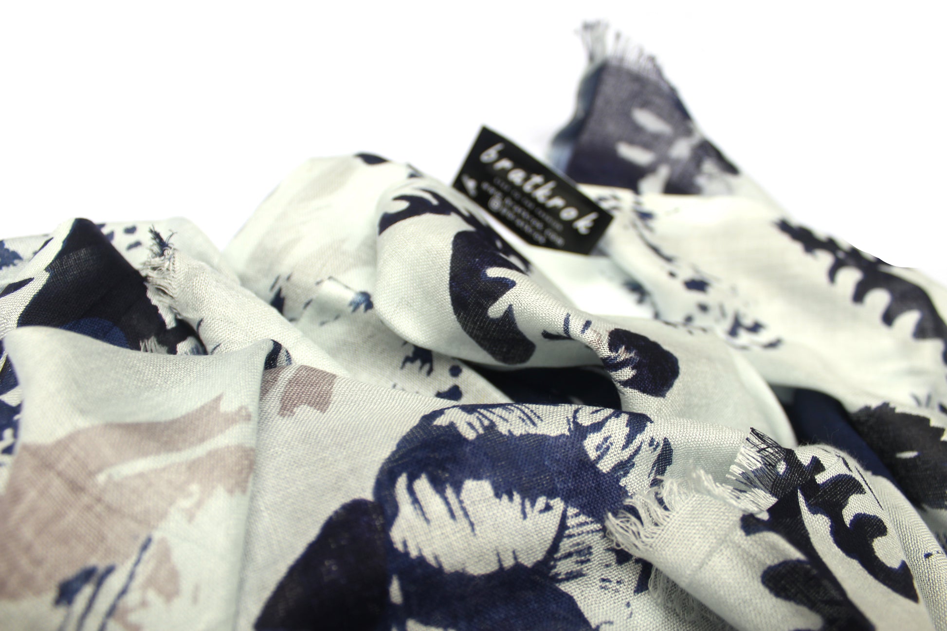 Cotton Rayon scarf texture close-up showing navy blue flower design