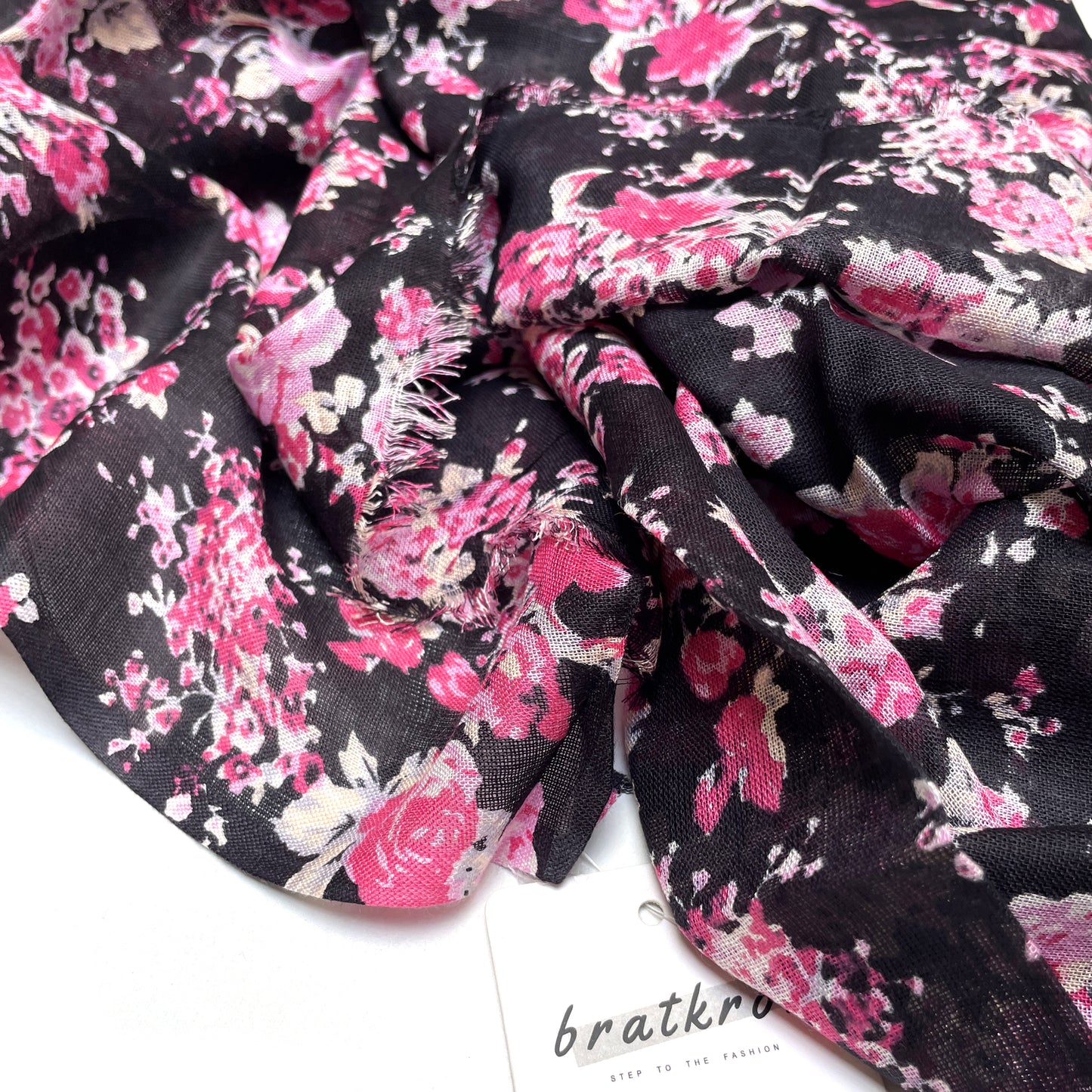 Cotton Rayon scarf texture close-up showing black stole with pink flowers