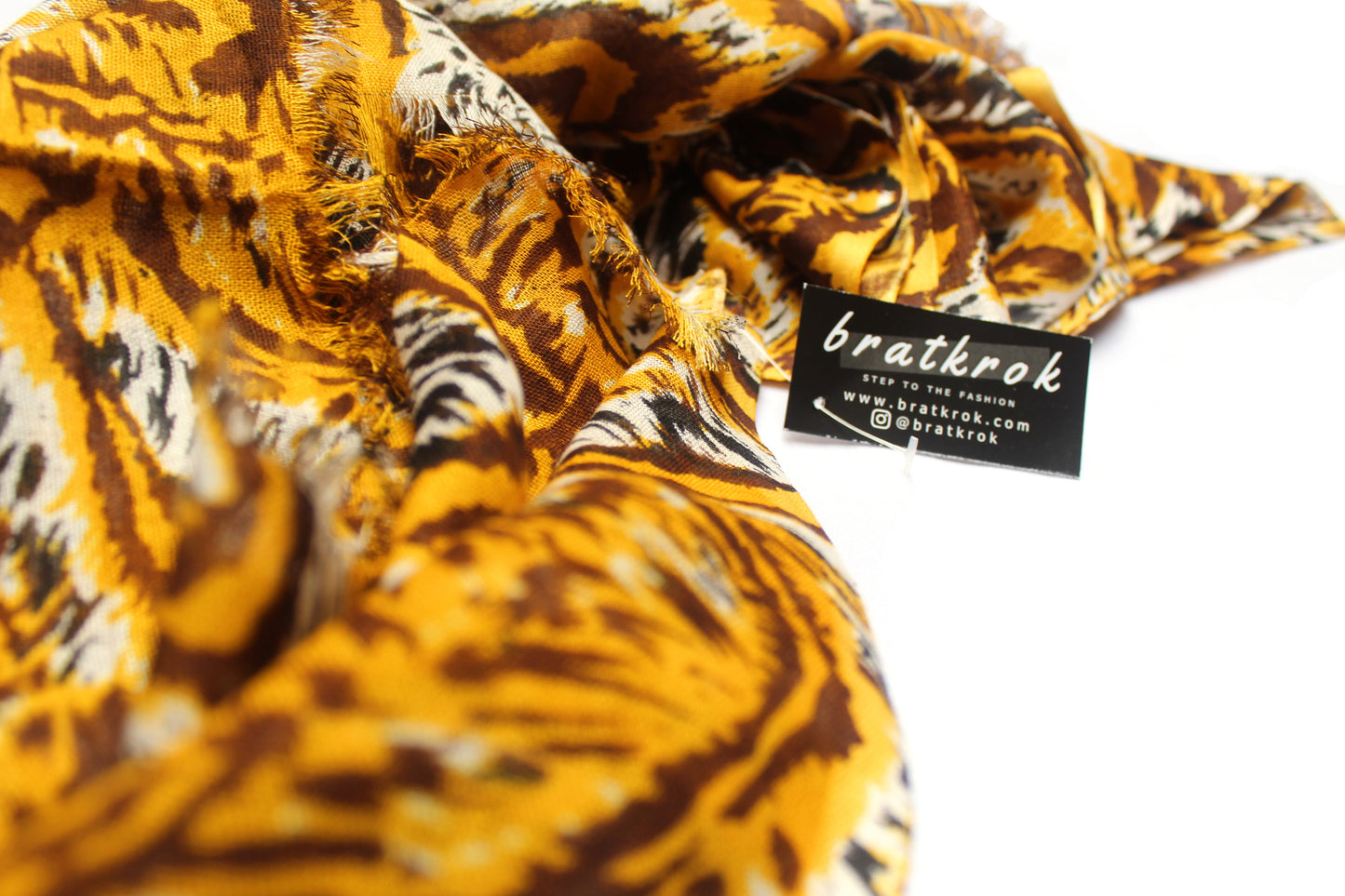 Cotton Rayon scarf texture close-up showing tiger prints